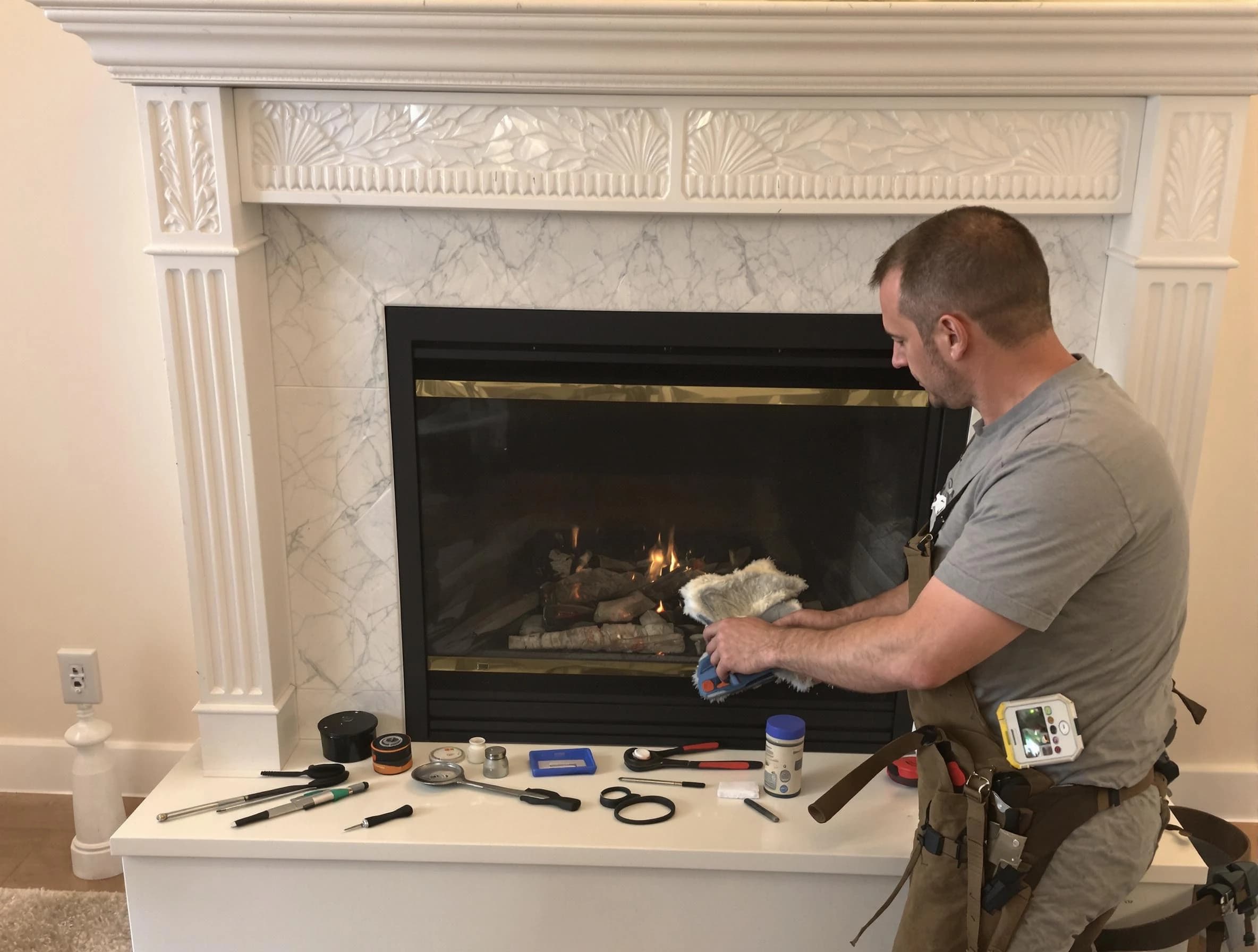 Passaic Chimney Sweep performing fireplace maintenance in Passaic, NJ